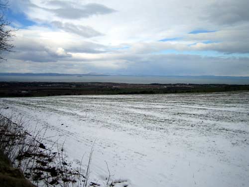 Left-hand view of Carberry Hill with the Firth of Forth in the distance