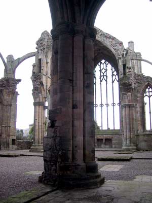 A view of the Presbytery and the High Altar behind the pillar