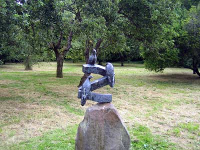 Bird sculpture in the orchard